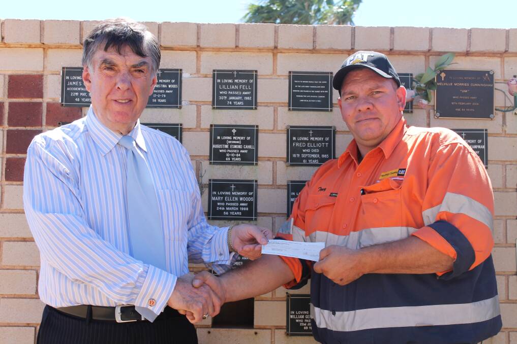 SHOW DONATION: Mount Isa Show Society vice president Tony Toholke is donating $15,000 on behalf of the show society to the Mount Isa City Council for beautification of the city's cemetery. - Picture: JASMINE BARBER/7576