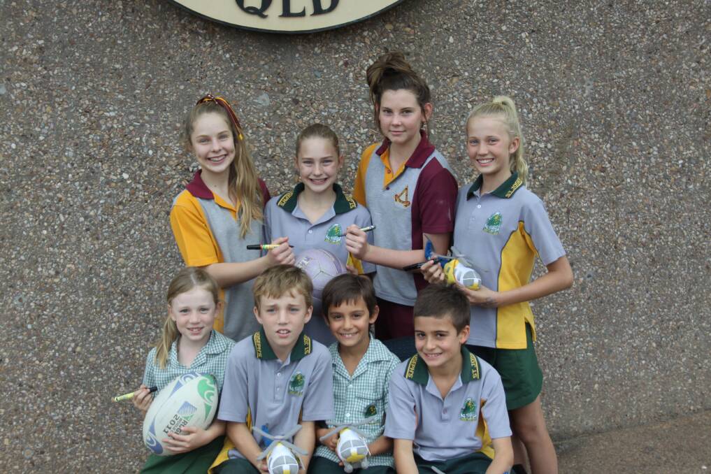SPORTS STARS: Ready to meet Scott Prince and Chelsea Pitman are, from back left, Chelsea McKavanagh, 13, Abbey McKavanagh, 11, Maddi Purkis, 14, Phoebe Ryder, 11, and front, from left, Zoe Ryder, 6, Darcy Ryder, 10, Kyle Reddicliffe, 8, and Darcy Reddicliffe, 10. - Picture: KIM WATERS/5951