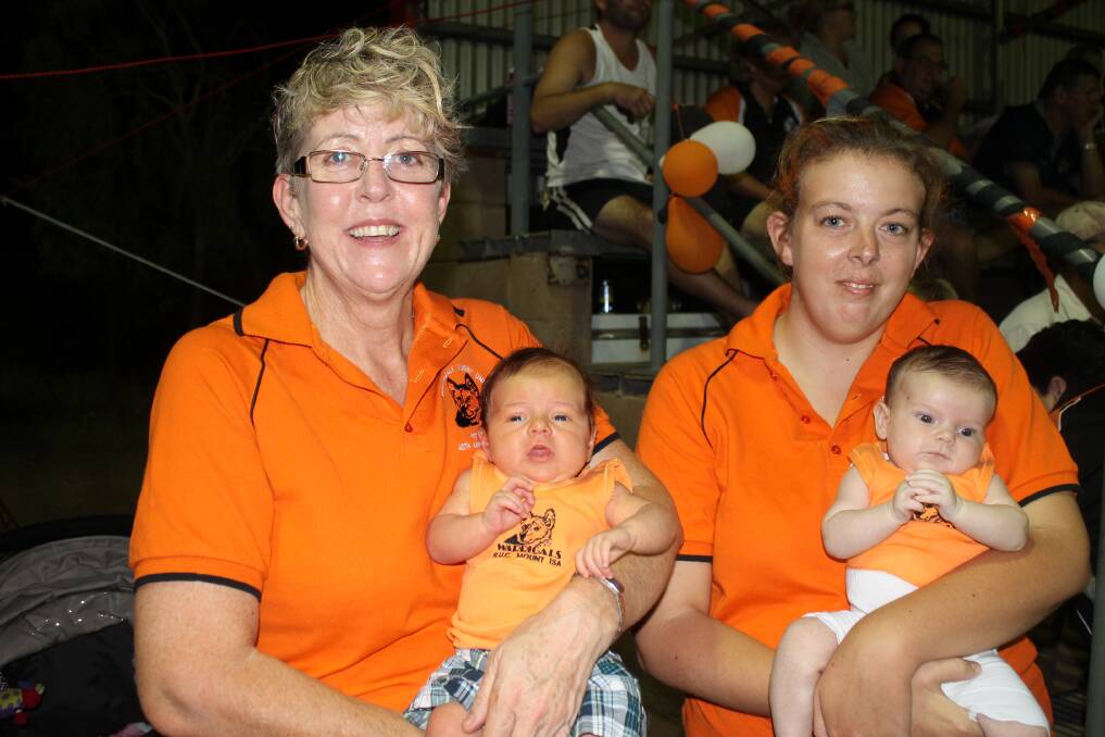FUTURE PLAYERS: Val Garrett, left with Toby Scotney, 1 month and Jaimi Corstiaans with Ruby Campbell, 2 months.