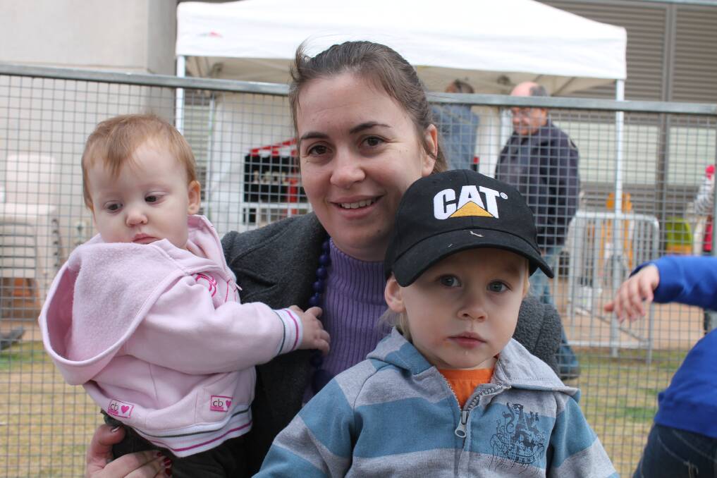 FAMILY FUN: Karrisa Smith with Micah Smith, 9 months, and Elias Smith, 2, have a day at the show.