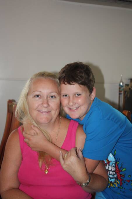 LOVING CARE: Foster carer Julie Hurst with son Hayden Hurst, 11. - Picture: JASMINE BARBER/7110