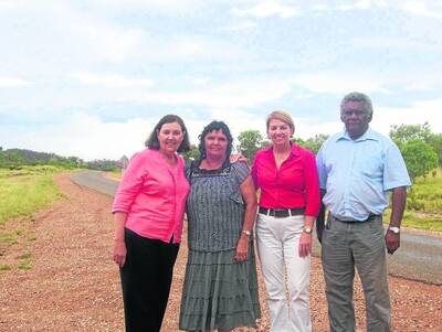REST STOP: Premier Anna Bligh and Member for Mount Isa Betty Kiernan celebrate the occasion with Dajarra elders Alex and Joan Marshall. - zz