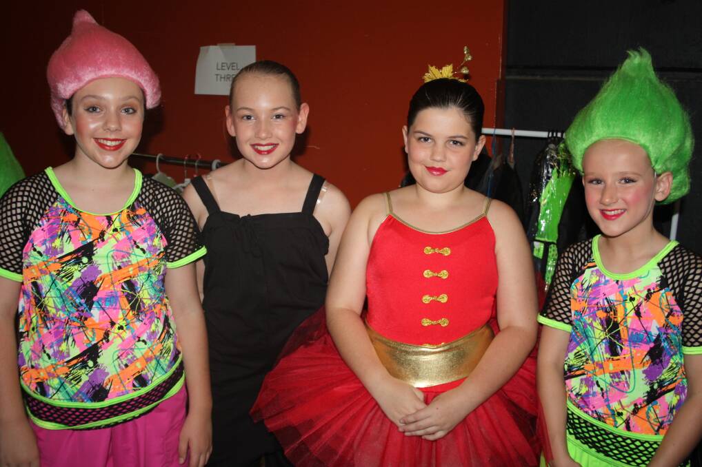 CREATIVE COSTUMES: Showing off their costumes before the show are, from left, Naomi Spitzner-Lewis, Sarah Hetherton, Rochelle Cremer and Tia Bird, all 10.