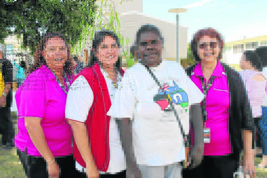 HEALING: Health worker Helen Burns, Aboriginal Liason Officer (ALO) Sharon Savuro, Noeleen Rockland and ALO Mary Cotterell pose for a photo together before getting a slice of cake.
