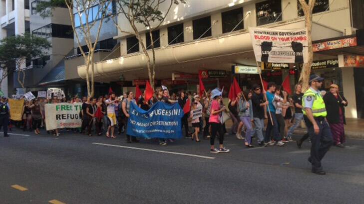 Hundreds of Brisbane residents walk down Adelaide Street protesting the Rudd government's new asylum seeker policy. Photo: Dan Nancarrow