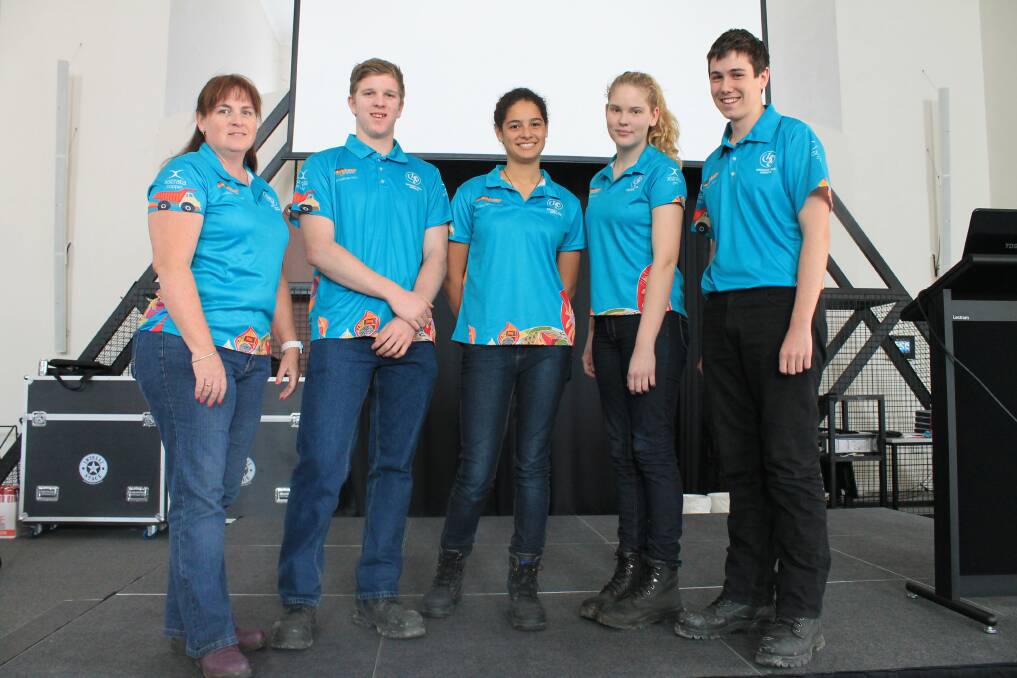 READY TO PRESENT: Project officer Robyn Flexman with QMEA students Boyd Collette, 17, from Gladstone, Lysani Pallay, 15, from Brisbane, Riana Newton, 16, from Ipswich, and Fraser Stevens, 16, from Brisbane before they made a presentation on Friday. - Picture: EMMA KENNEDY/7723