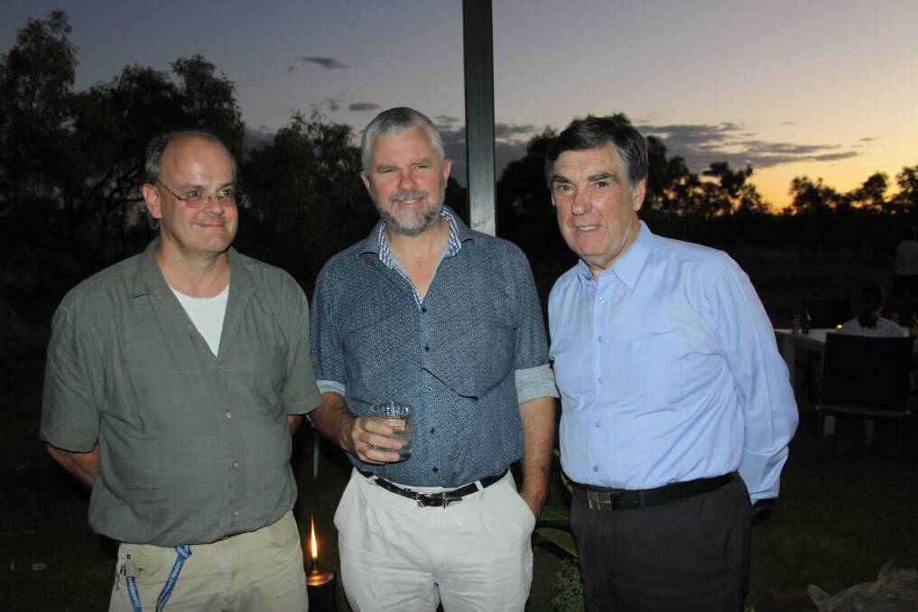 DRINKS AT SUNSET: Party host Dr Ulrich Orda with guests Dr Chris King and Mount Isa Mayor Tony McGrady.