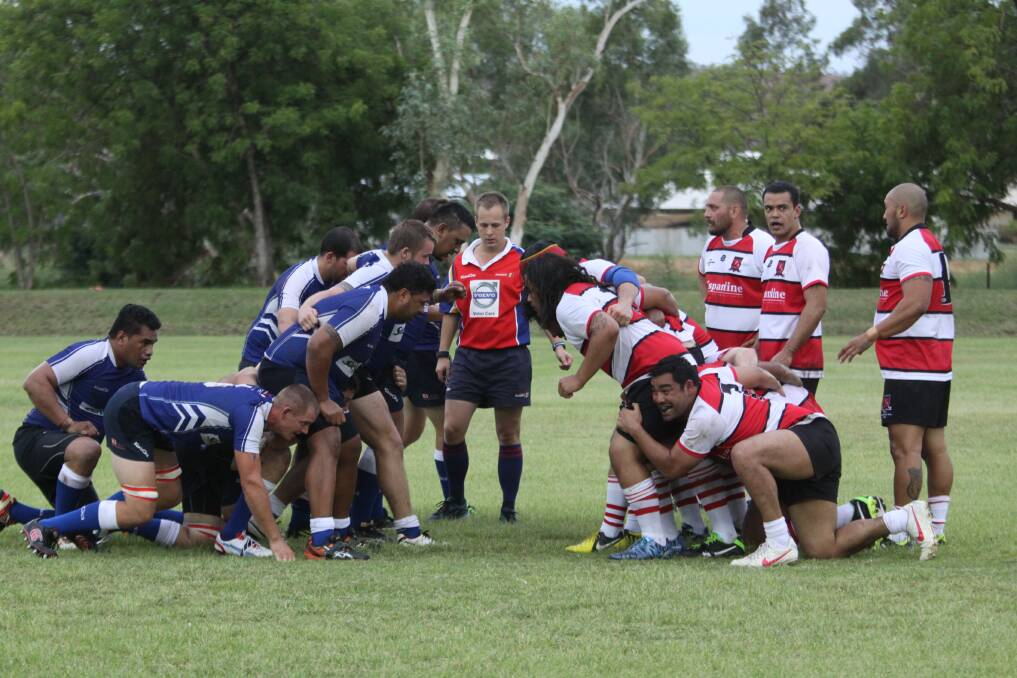 TOUCH, HOLD; Cairns Thunder and Mount Isa prepare for scrum time.