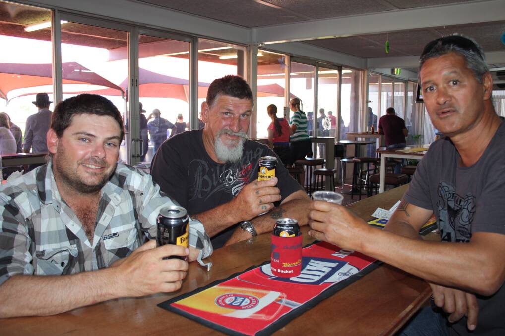 CHEERS MATE: Discussing their pre-race tips are, from left, Shane Edwards, Paul Dymock and Lenard Kenny.