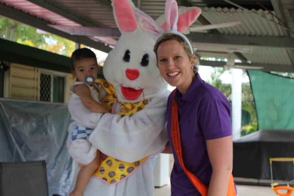 STILL SLEEPY: Eli Geary, 15 months, was up bright and early yesterday morning to say hello to the Easter Bunny and Queen Quest entrant Cara Nolan.