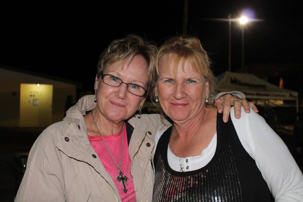 GIRLS NIGHT OUT: Maureen James and Rose Connolly catch up for some rodeo action.