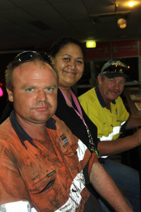 MATES: From left, Ricky Eames, duty manager Fia Leuluaialii and Mick Page-Aupfer.