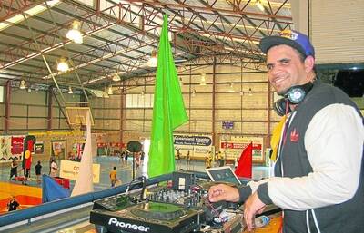 RAPPIN: Rapper and DJ Jimblah kept a steady stream of music for the children's activities yesterday.