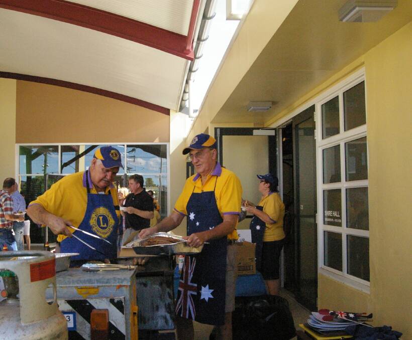 BACON AND EGGS: Don Govan and Philip Gibson cooking up a storm at breakfast.