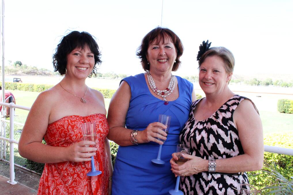 CHAMPAGNE TOAST: Kelly and Barbara Waters with Janelle Watson enjoyed sharing a glass of bubbly at the races.