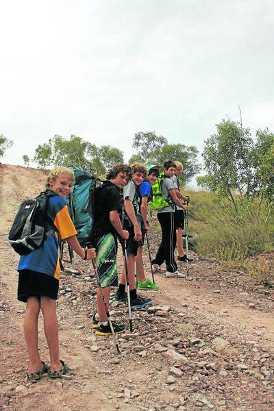 READY TO TRAIN: Set with trekking poles and backpacks, the boys from left, Casey Larkin, 11, Ben Allen, 16, Brodie Larkin, 14, Billy Atherinos, 16, Jordan Pickering, 17, and Riley Larkin, 16, will begin training this week before embarking to Papua New Guinea to complete the Kokoda Trail. - Picture: CHANELLE SZMOLNIK