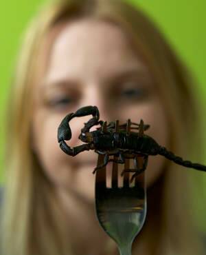 Skye Blackburn in Sydney, with her new addition to her edible insect range, scorpions. Photo: Janie Barrett