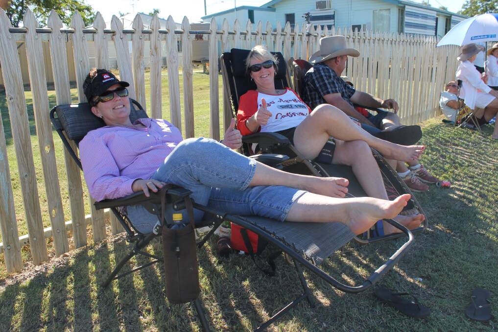 AUSSIE COMFORT: Natalie Lillis and Jenny Tully from Mount Isa are the most relaxed spectators to watch the junior triathlon.
