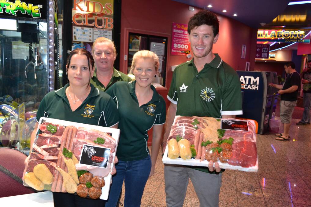 FUNDRAISING: Susan Oleary, Teresa Jack, Brendan Scheiwe and Terri Dalgleish do some fundraising for their soccer team the Isaroos.