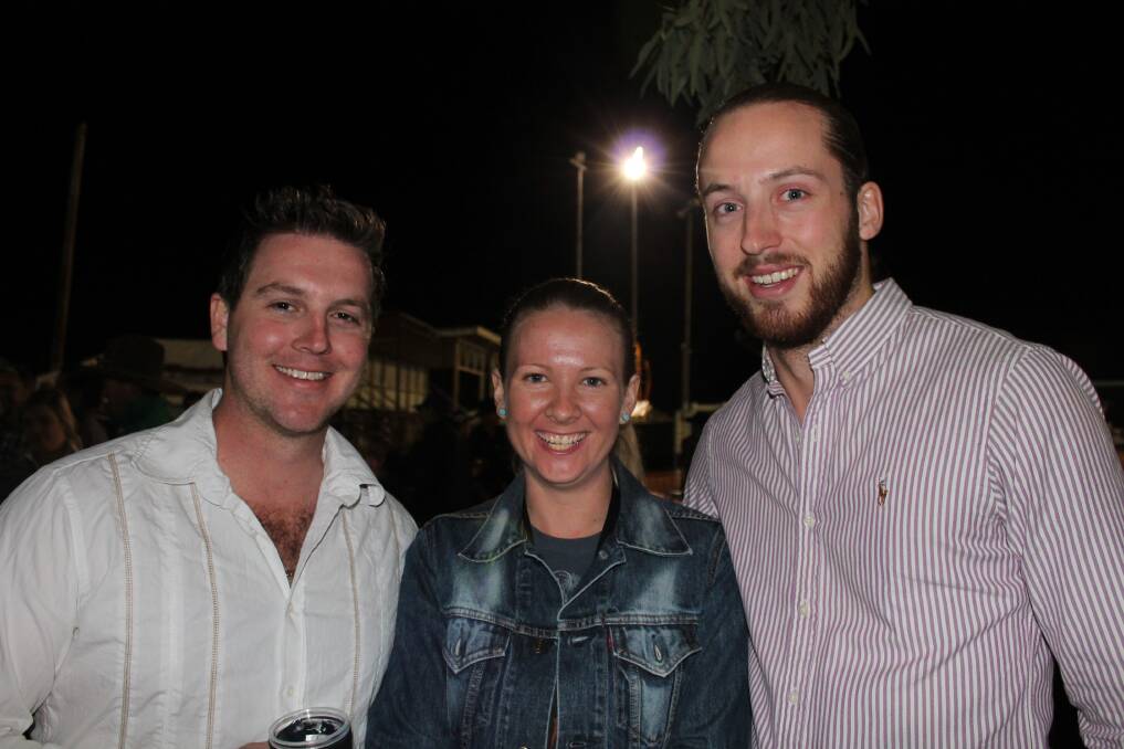 FUN: Rohan Riesener, Kate Cusack and John Doody catch up at the muster.