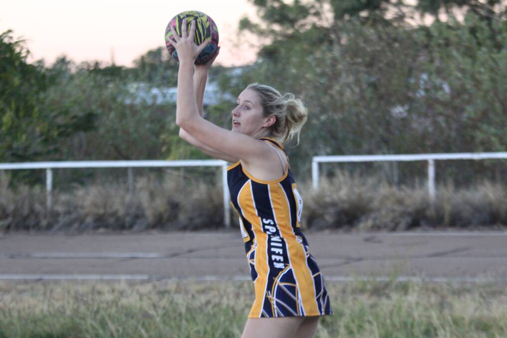 LENGTH: Lauren Raggatt shows off her impressive height to take the ball.