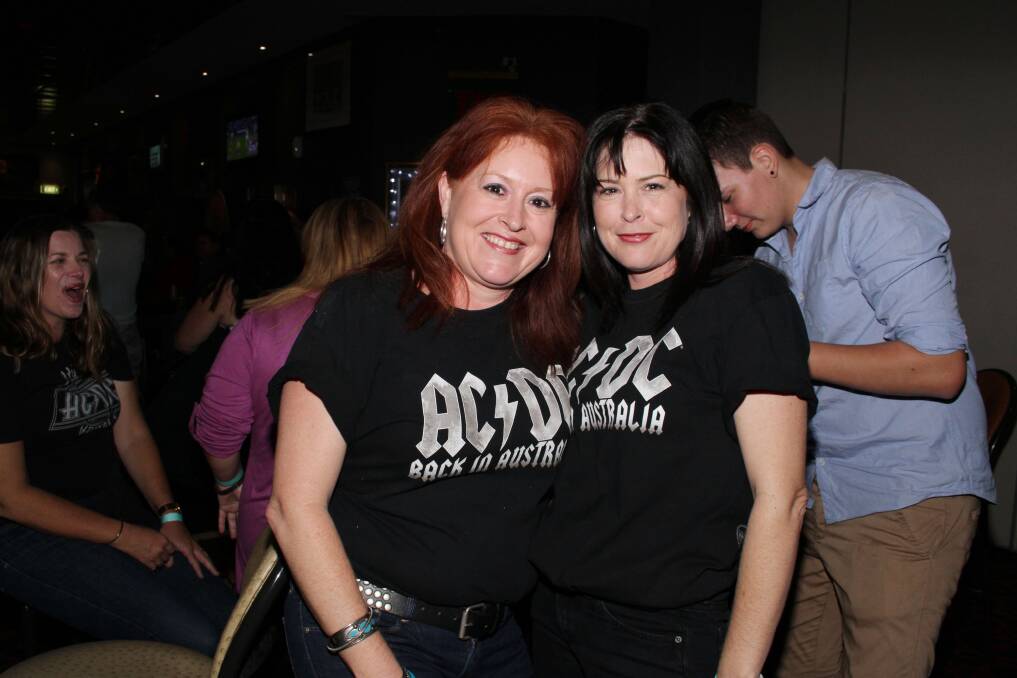 SISTERS: Annie Cremer and Julia Holpen looked like the biggest fans of the night in their ACDC t-shirts.