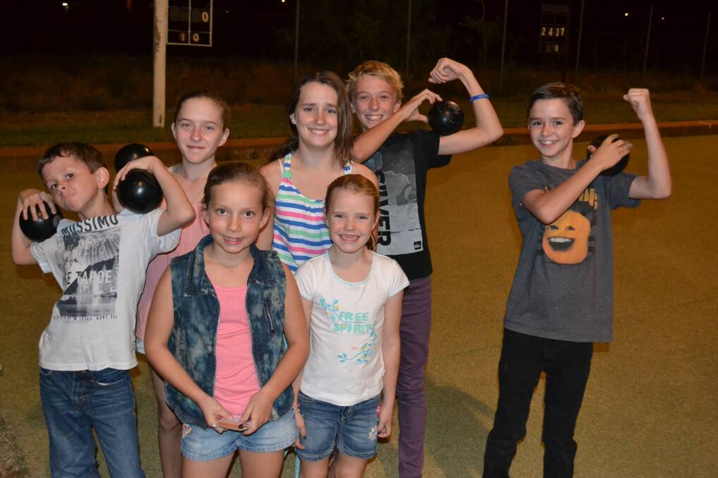 CHEEKY: Amy Bailey, 6, Cooper Guningham, 9, Amy Kuhne, 9, Olivia Fricke, 11, Tara Bailey, 11, Heath Kelsey, 11, and Toby Guningham, 11, show their bowling muscles.