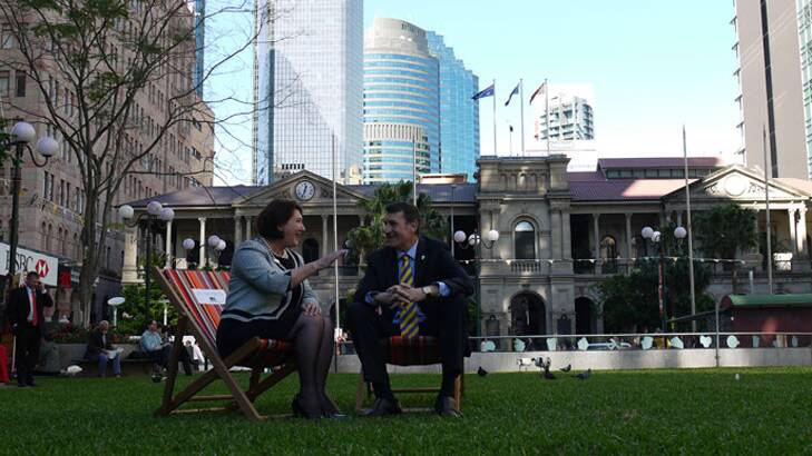 Brisbane Councillor Vicki Howard and Lord Mayor Graham Quirk test out the deck chairs. Photo: Katherine Feeney