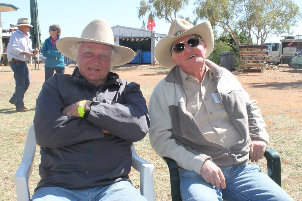 RECORD BREAKERS: Old drovers Cleve Smith (Hughenden) and Jimmy Kennedy (Redland Bay) caught up to chat about their days working the land and branding for work, not play. Mr Kennedy said the team he worked with on Lorraine Station in the Gulf country broke the record in 1952 for branding the most cattle in a day.