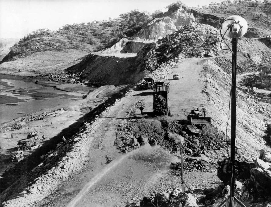 SET UP: Construction of the dam wall in 1957.