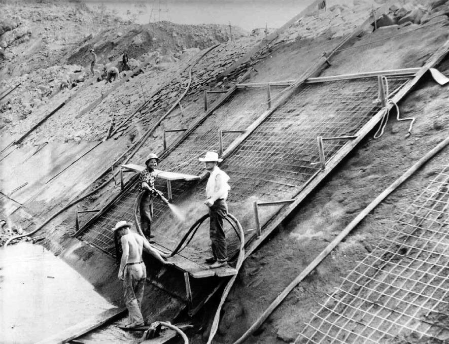 HARD WORK: Construction of the dam wall face in 1957.