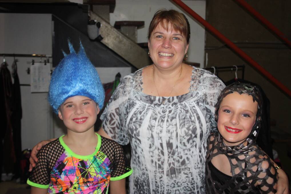 MAKING MEMORIES: Sharing a laugh before the show are, from left, Gunter Nolle, 9, Debbie Fisher and Emily Fisher, 8.
