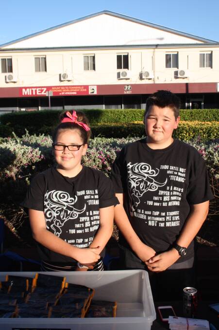 KIDS AT WORK: Helping out at the Jim's Jerky stall are Kasey, 10 and Cody McKie, 13.