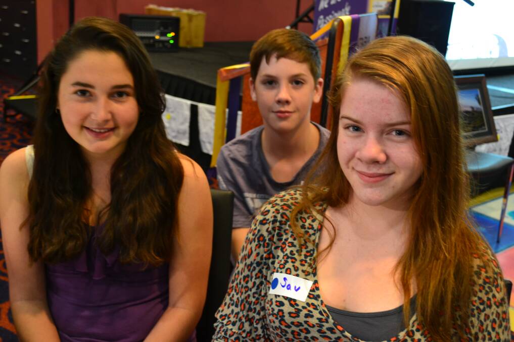 FRIENDS: Stephanie Spena, Zane Graham and Savannah Graham hang out at the relay launch.