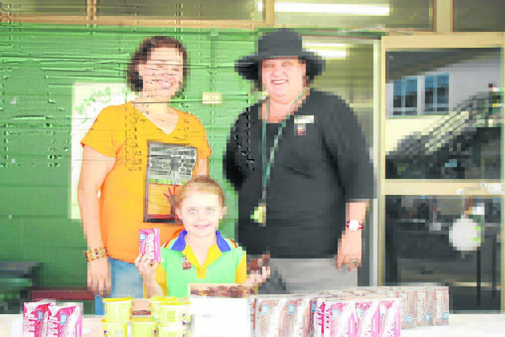 HEALTHY BREAKFAST: From left, Indigenous education officer Codie Kemp, Holly Greenhalgh, 5, and school principal Louise Vella-Cox aim to close the gap. - Picture: JASMINE BARBER/7505