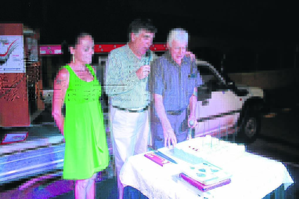 HAPPY BIRTHDAY: 4LM's Jodie Shepherd and Mayor McGrady surprise Bob Keoghan with a birthday cake.
