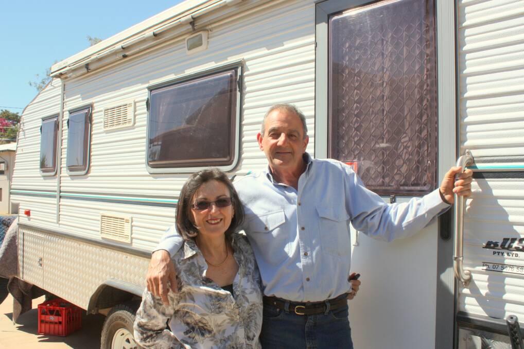 SECOND CHAPTER: Cyril and Yvonne Ellis will begin their new chapter travelling with a caravan in tow around Australia, after selling their beloved business Isa City Pawnbrokers this month. - Pictures: CHANELLE SZMOLNIK