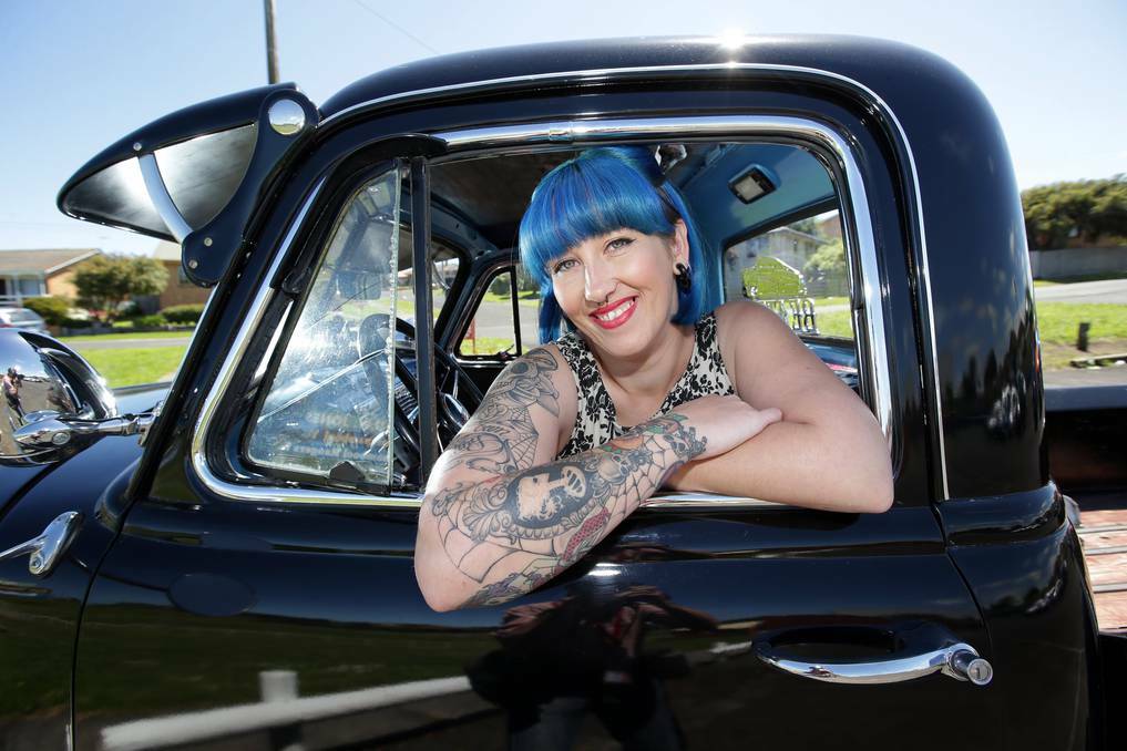 Mel McLean from Warrnambool sitting in her 1952 chev ute shows her tattoo sleeve. Picture: DAMIAN WHITE