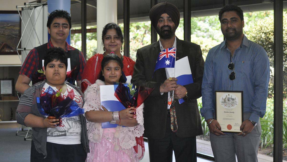 Harman Singh, Yuvrag Singh, Daljit Kaur, Niman Singh, Jagjit Singh and Varinder Pal Singh, originally from Punjab in India, following a citizenship ceremony at Murray Bridge in South Australia.
