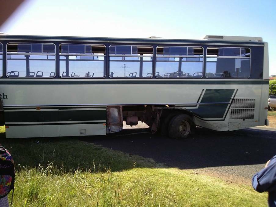 Damage to a bus after a vehicle smashed in to its rear at Hanwood, near Griffith in NSW, on Tuesday. Four students were treated for injuries.
