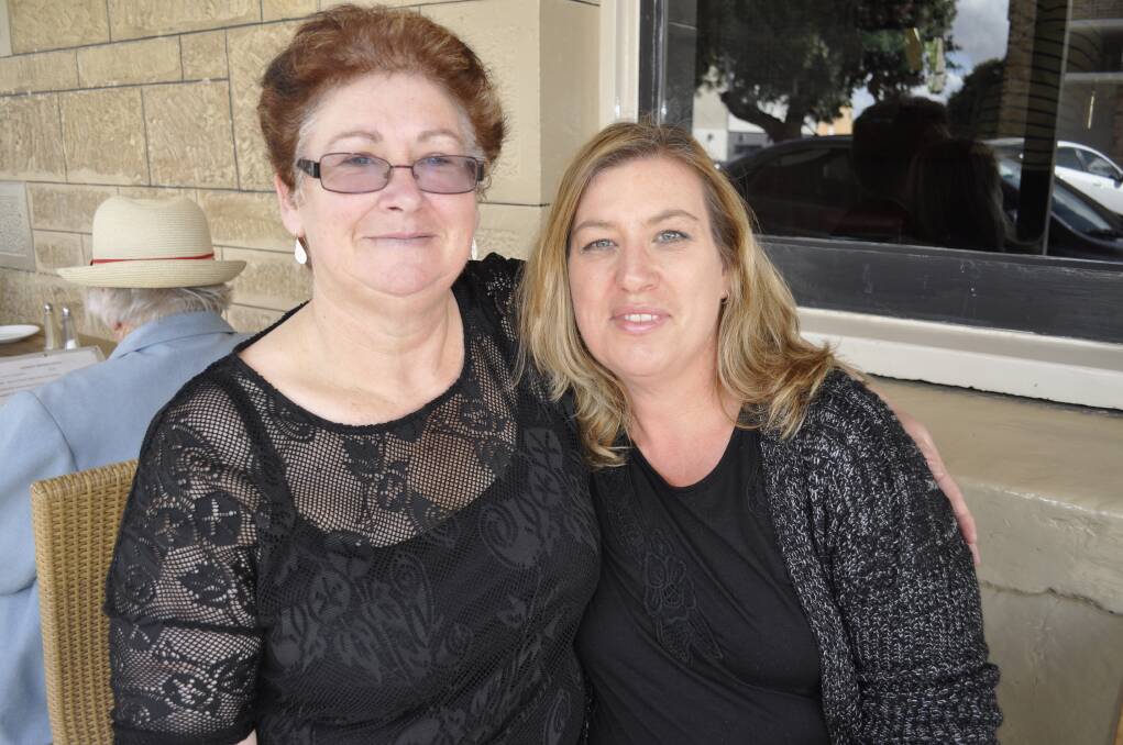 Elaine and Paula Mayfield enjoy lunch in the sunshine at the Murray Bridge Hotel on Sunday.