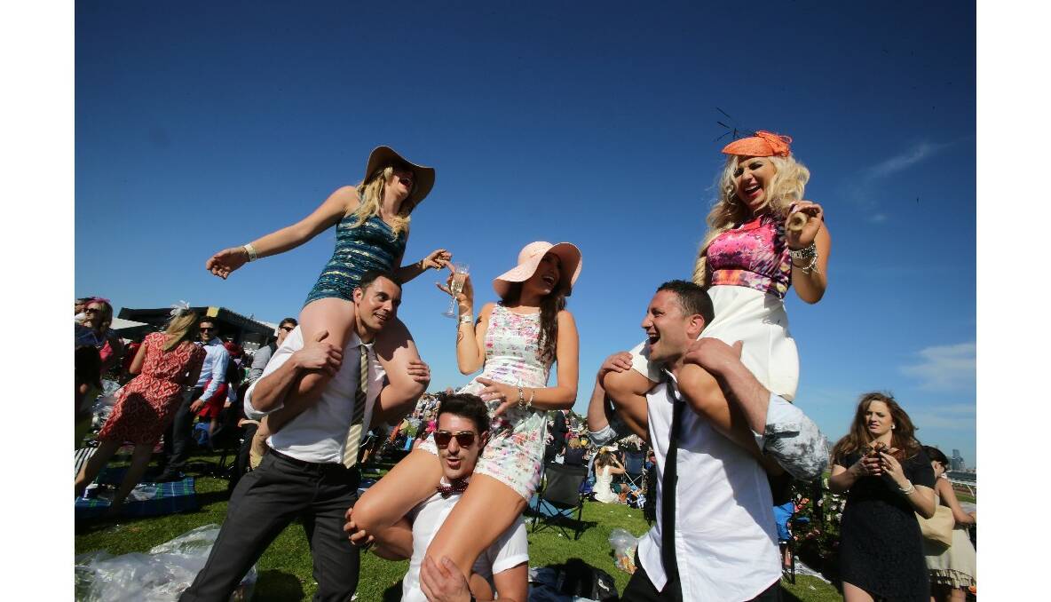 Race fans enjoying the champers and sun late in the day at the Melbourne Cup. Picture by Justin McManus.