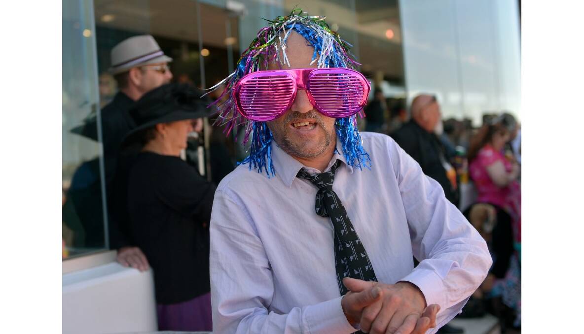 Sporting a look inspired by the movie The Fly Michael Travers brought a touch of horror to the 2013 Melbourne Cup. Picture by Michael Clayton-Jones.