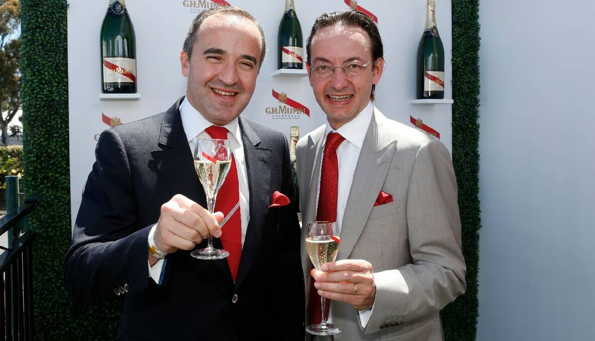 Philippe Guettat (L) CEO of Martell Mumm Perrier Jouet and Julien Hemard at Birdcage at the 2013 Melbourne Cup. Photo by Eddie Jim/The Age.