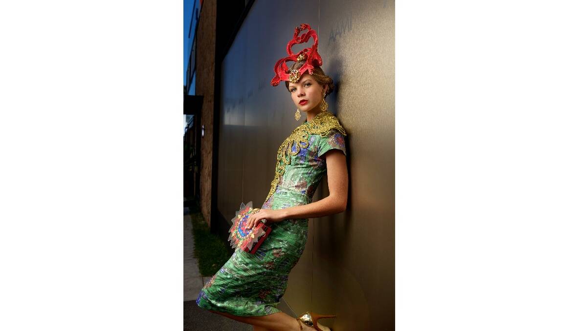 Gracyn Masterson of North Queensland in a design by Sonlia at the Melbourne Cup Fashions on the Field. Picture by Simon Schluter.