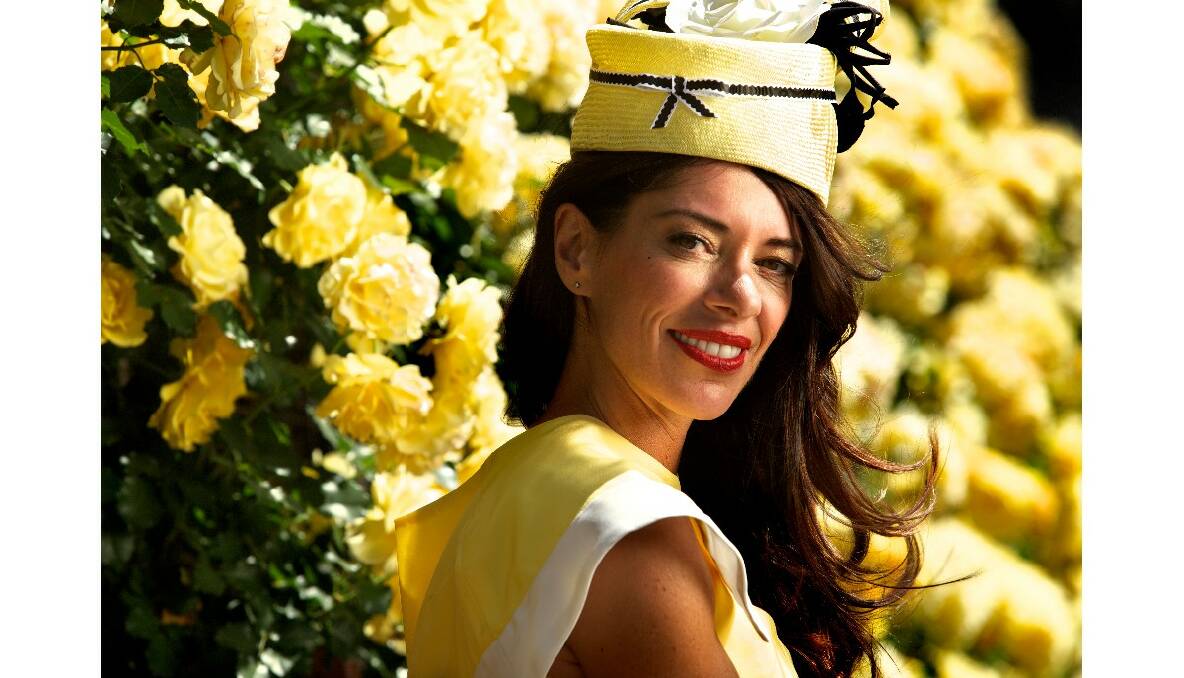 Theodora McKenzie in a Rose design pillbox hat at the Melbourne Cup Fashions on the Field. Picture by Simon Schluter.