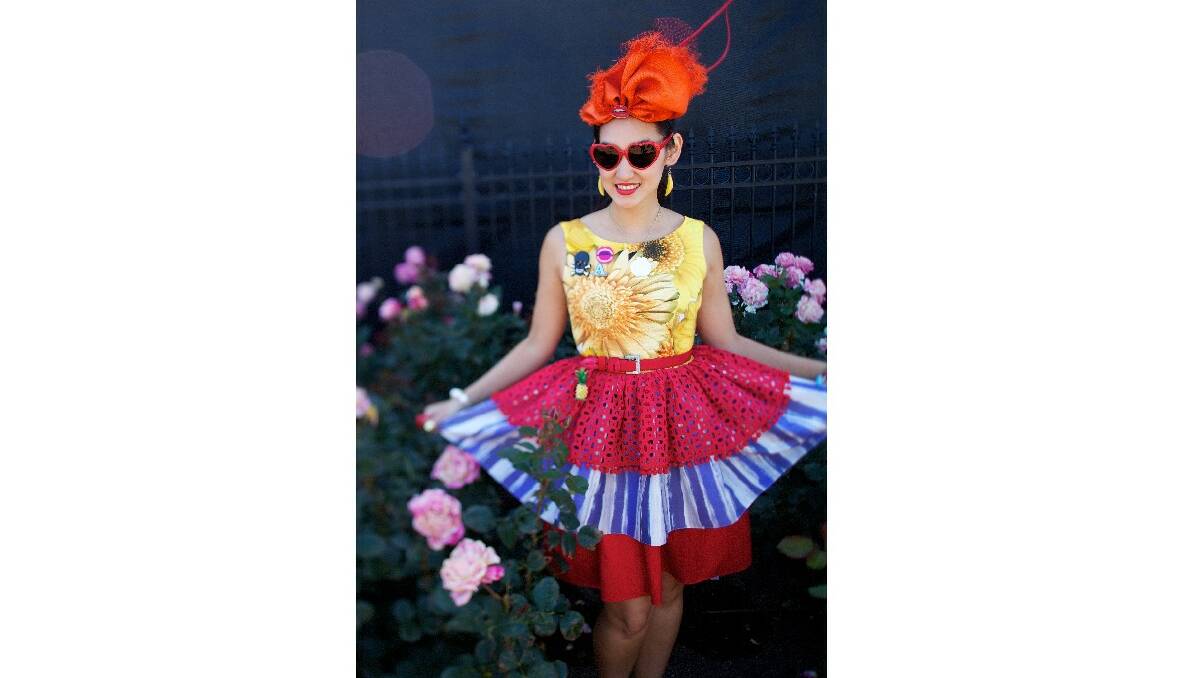 Angela Menz with a dress she designed herself at The Melbourne Cup Fashions On The Field. Picture by Simon O'Dwyer/The Age.