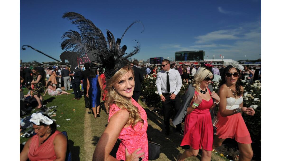 Crowds enjoy the day at Flemington racecourse. Picture by Joe Armao.