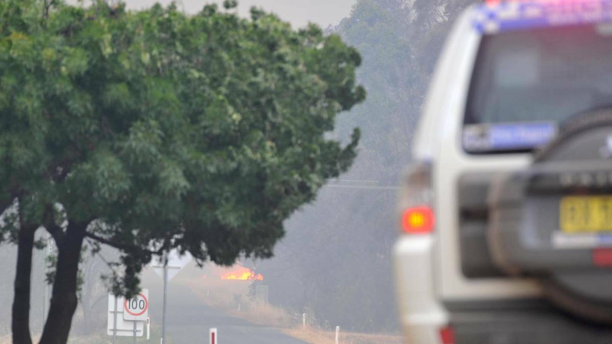 The blaze approaches the township of Stockinbingal. Picture: Michael Frogley. 