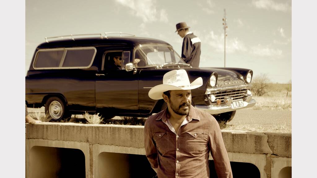 Aaron Pedersen stars in Mystery Road, which was filmed in Winton. Publican Paul Nielsen works to attract filmmakers to the area.